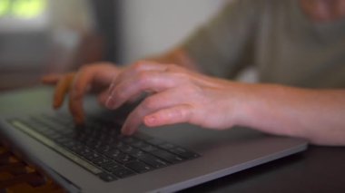A programmer is writing program code.
