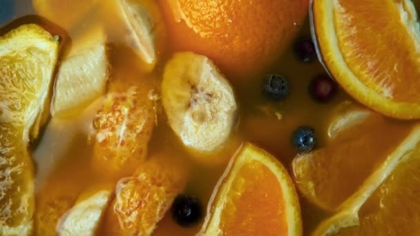 Making Fresh Juice Lemon Orange Banana Blueberry — Wideo stockowe