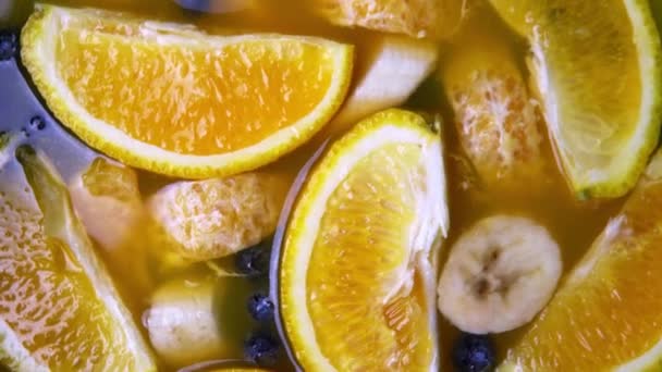 Fresh Multifruit Juice Lemon Orange Blueberry Rotation — ストック動画
