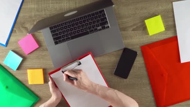 Worker Making Notes Using Pen Table View Files Notebook Phone — 图库视频影像