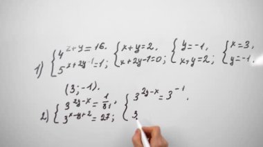 Young male student is writing equation on whiteboard. Math algebra lessons, education concept. Solving equation close up.