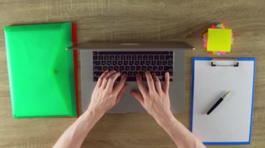 The developer is working with laptop. Modern workplace. Mockup concept.
