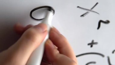 Mathematical formula solution on white board. Vertical video. High quality footage