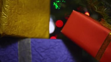 The pile of presents in corrugated gift wrap for New Year close up.