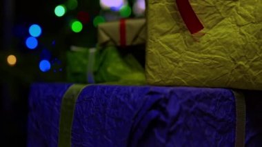 Gifts in corrugated paper for Christmas in rotation close up.