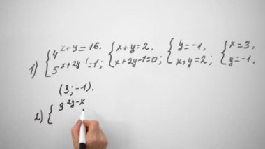Writing mathematics equation on whiteboard. Math algebra lessons, education concept. Writing equation close up.