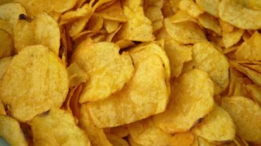 Potato chips rotating close up. Fast food snacks. High quality 4k footage