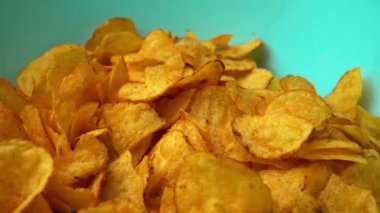 Potato chips rotating close up. Fast food snacks. High quality 4k footage