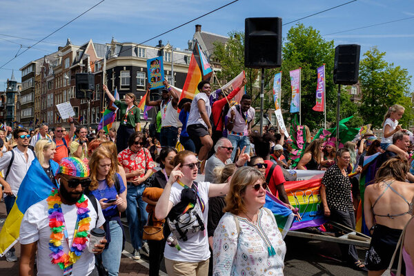 AMSTERDAM - JULY 30: Pride Amsterdam 2022 kicks off with Pride Walk on July 30, 2022 in Amsterdam, The Netherlands. This annual event is meant to celebrate freedom and diversity.