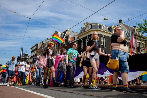 AMSTERDAM - JULY 30: Pride Amsterdam 2022 kicks off with Pride Walk on July 30, 2022 in Amsterdam, The Netherlands. This annual event is meant to celebrate freedom and diversity.