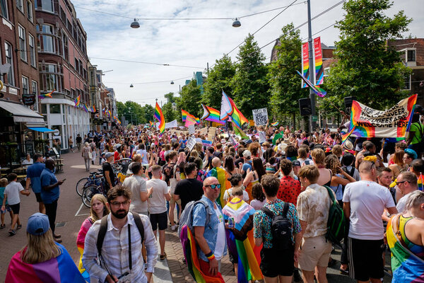 AMSTERDAM - JULY 30: Pride Amsterdam 2022 kicks off with Pride Walk on July 30, 2022 in Amsterdam, The Netherlands. This annual event is meant to celebrate freedom and diversity.