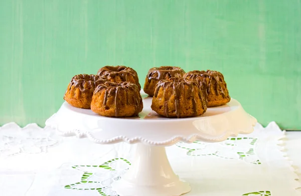 Mini pumpkin bundt cakes with chocolate — Stock Photo, Image
