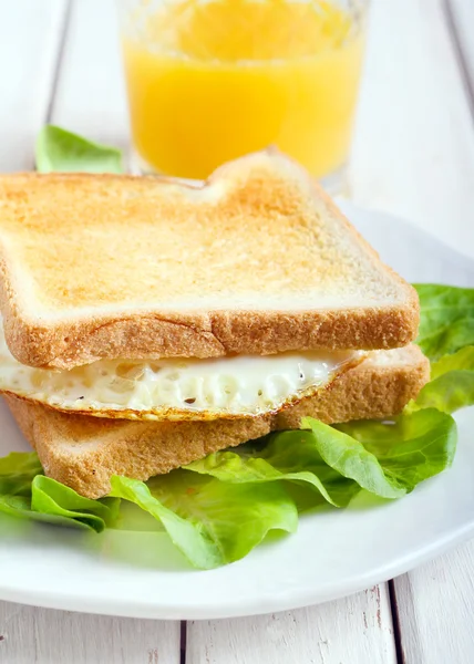 Toasts with fried egg — Stock Photo, Image