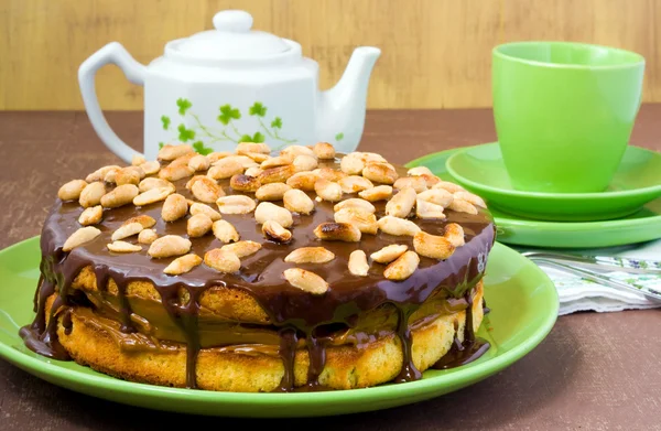 Peanut and caramel cake with chocolate glaze — Stock Photo, Image