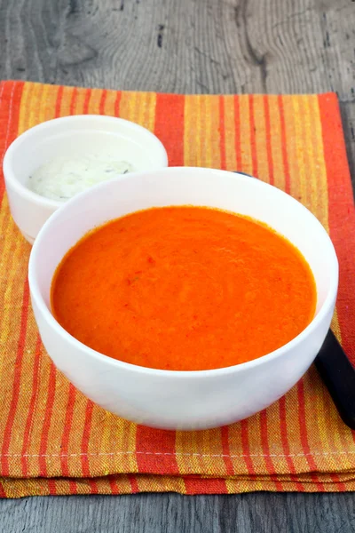 Spicy pepper and tomato soup with cucumber yogurt — Stock Photo, Image