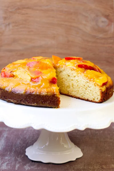 Sponge cake with peach mousse — Stock Photo, Image