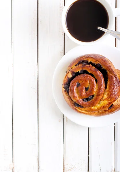 Bun en kopje koffie — Stockfoto