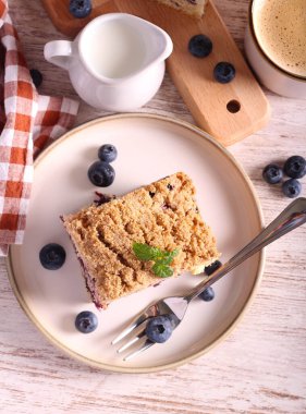 Classic blueberry buckle cake crumble topping berry cake slices