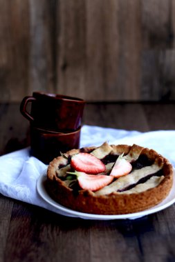 Strawberry tart on a plate clipart