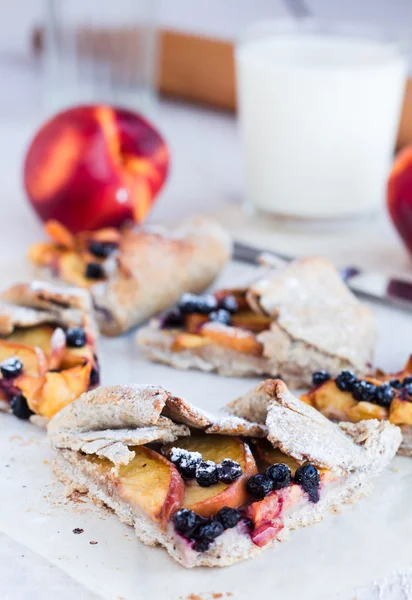 Cut biscuits with peach and blueberry — Stock Photo, Image