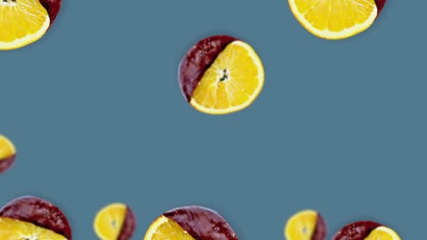 Flying Orange Slices Chocolate Move Center Trending Blue Background Horizontaal — Stockvideo