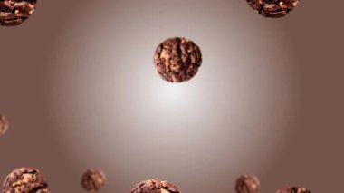 Kahvaltıda farklı çaplarda lezzetli çikolatalı kurabiyelerden oluşan bir akıntı eğilimli bir renk grubunda. 4K UHD görüntüsü. Geleceksel tasarım, hareket tasarımı animasyonu. Pop sanat tasarımı, yaratıcı Noel tatlısı yemek konsepti.