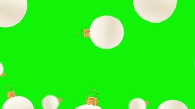 İzole edilmiş arka planda yeşil ekranda farklı çaplarda uçan boş beyaz noel topu. Arkaplan kalıbı hareket ediyor. Animasyon Arka plan. Yüksek kalite 4 bin Noel görüntüsü..