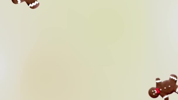 ジンジャーブレッドマンのストリーム 白い色の背景に異なる直径のクリスマスジンジャーブレッド Uhd映像 未来的なデザイン モーションデザインアニメーション ポップアートデザイン 創造的なクリスマススイーツのフードコンセプト — ストック動画