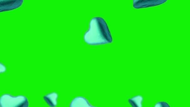 空飛ぶハートの形をしたチョコレートキャンディーが飛び 孤立した背景にさまざまな直径の角度で飛んでいます 高品質4K Uhd映像 バレンタインデーの休日のコンセプト — ストック動画