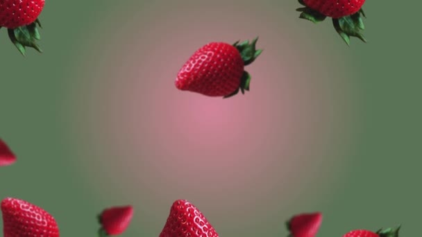 Flying Wiggle Different Diameters Whole Strawberries Green Leaves Trending Pink — Stock Video