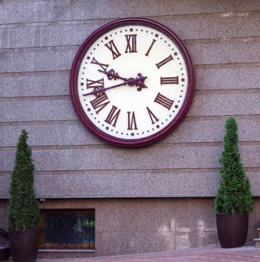 Kiev, Ukraine June 10, 2021: Big clock on a city building in the city of Kiev