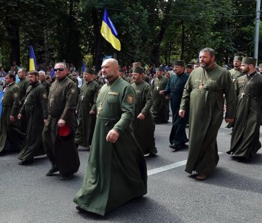 Kyiv, Ukraine August 24, 2021: A column of military chaplains at the celebration of 30 years of independence of Ukraine in Kyiv clipart