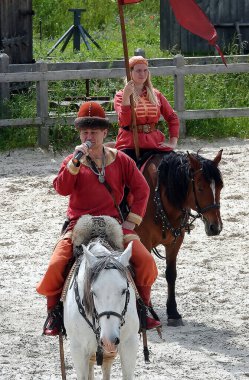 Kiev, Ukraine June 19, 2021: show in the entertainment complex Kievskaya Rus - Beautiful rider on a horse in an old outfit