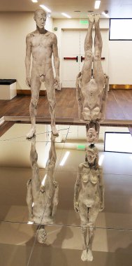 Kiev, Ukraine March 08, 2017: Sculpture of nude men and women, a woman stands on her head.