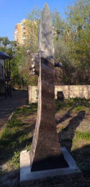 Kyiv, Ukraine April 24, 2019: Art sculpture called Drop is a marble block in the form of splashes from a drop