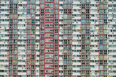 Kiev, Ukraine July 20, 2019: Urban high-rise apartment building with windows and many air conditioners