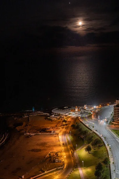 View from the 38th floor of the Havana building in the city of Mar del Plata. Night view of \