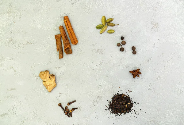 Ingredients for Indian masala tea on white background — Stock Photo, Image