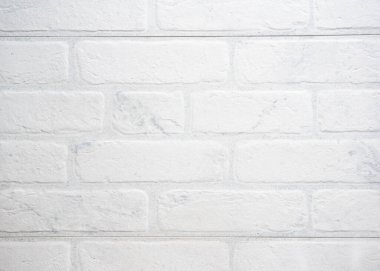 Beyaz tuğla bir duvarın modern dokusu bir arkaplan ya da bir tasarım için örnek olarak kullanılabilir. Yüksek kalite fotoğraf