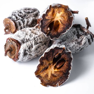 Beyaz arka planda kurutulmuş hurma. Sağlıklı beslenme. Yüksek kalite fotoğraf