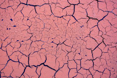 Bir binanın ya da duvarın çatlak ve hasarlı yüzeyi. Doku, eski boya arka planı. Yüksek kalite fotoğraf