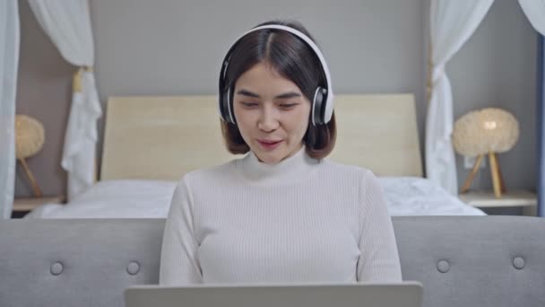 Happy Young Woman Wear Wireless Headphones Make Video Call Online — Wideo stockowe