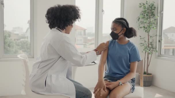 African American Doctor Applying Plaster Child Shoulder Being Vaccinated Opening — Vídeos de Stock