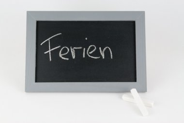 Tafel Ferien mit Kreide