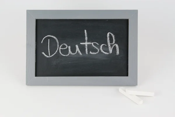 Tafel Deutsch mit Kreide — Stok fotoğraf