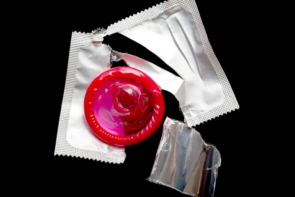 Red condom — Stock Photo, Image