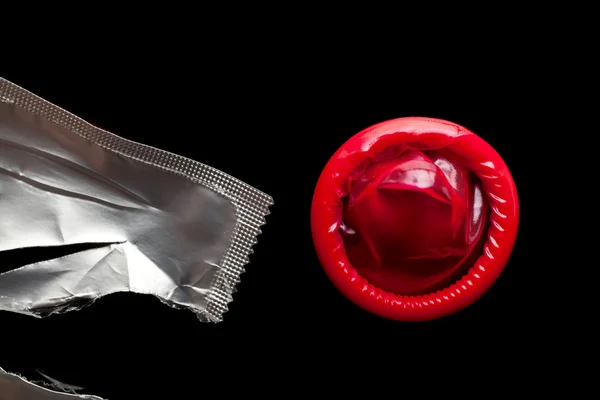 Red condom — Stock Photo, Image