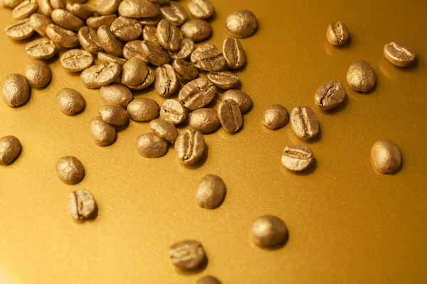 Zlatý kávová zrna — Stock fotografie