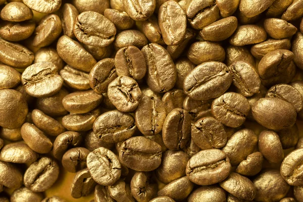 Złote ziarna kawy — Zdjęcie stockowe