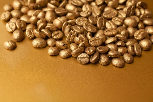 Gouden koffie bonen — Stockfoto